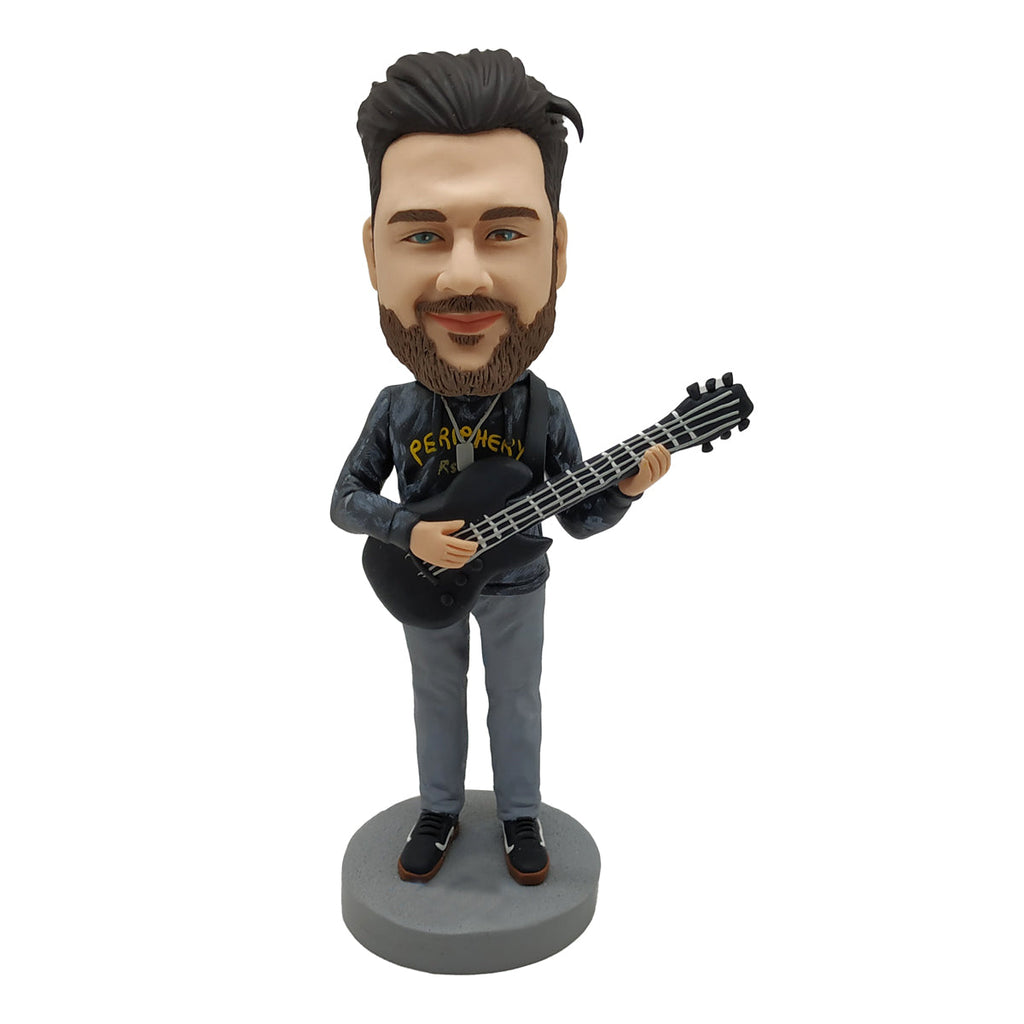 Bobblehead-pop voor muziekliefhebbers met gitaar