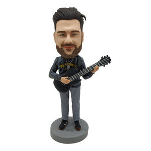 Bobblehead-pop voor muziekliefhebbers met gitaar