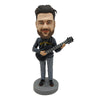 Bobblehead-pop voor muziekliefhebbers met gitaar