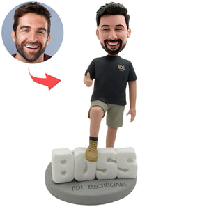 Bobblehead met baasthema