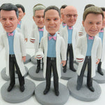 Grote bestelling van gepersonaliseerde bobbleheads van tandartsteams (minimaal 5 stuks)