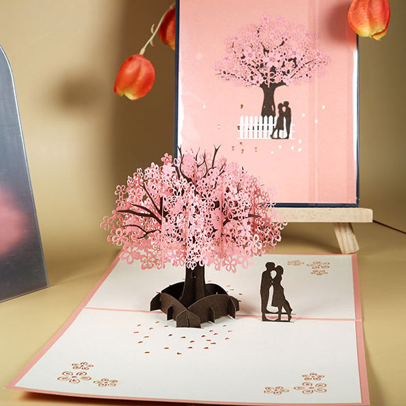Romantisch paar onder kersenboom 3D pop-up wenskaart