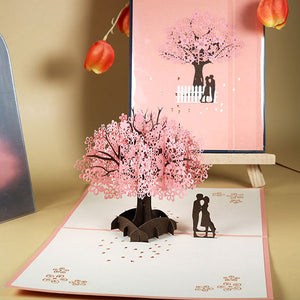 Romantisch paar onder kersenboom 3D pop-up wenskaart