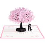 Romantisch paar onder kersenboom 3D pop-up wenskaart