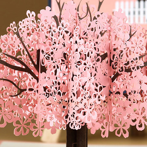 Romantisch paar onder kersenboom 3D pop-up wenskaart