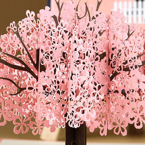 Romantisch paar onder kersenboom 3D pop-up wenskaart